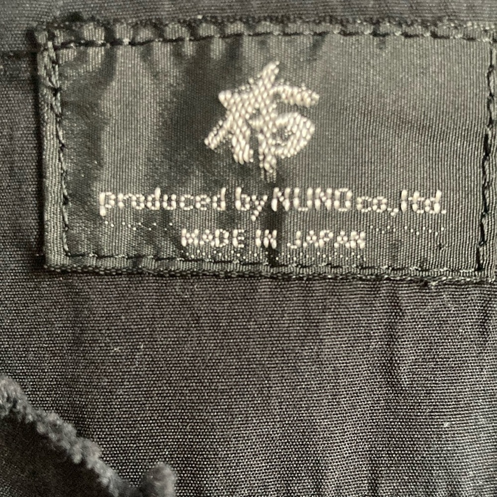 Black NUNO Co. Ltd. Garment